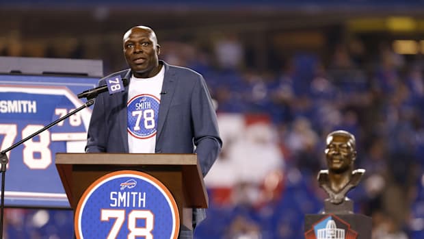 Sep 15, 2016; Orchard Park, NY, USA; Buffalo Bills former player Bruce Smith speaks as his number is retired in a ceremony during halftime against the New York Jets at New Era Field. The Jets beat the Bills 37-31.